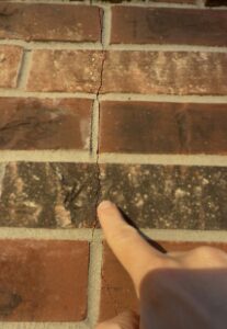 Spring home maintenance inspection in Northwest Houston. Cracked bricks